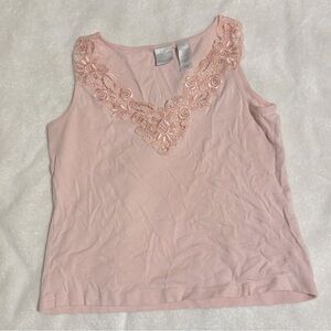 Pink laced top.